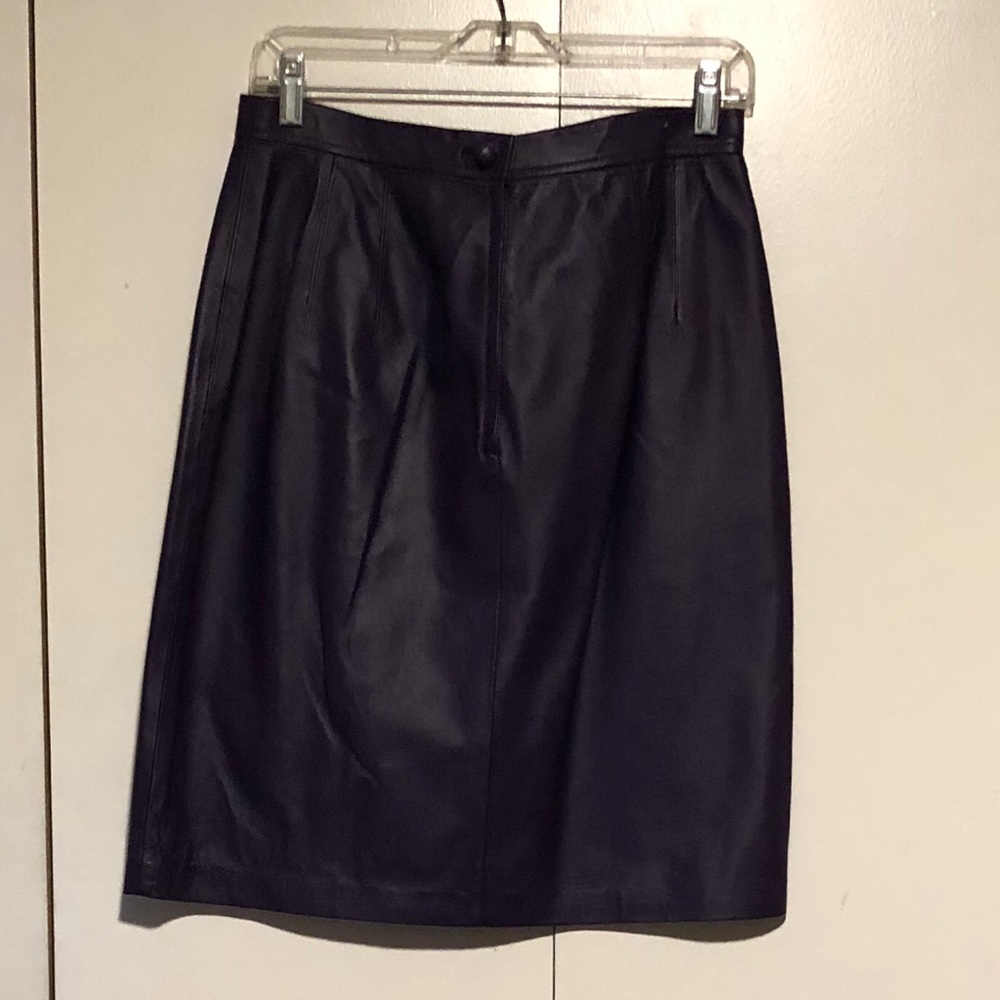 Purple leather skirt.